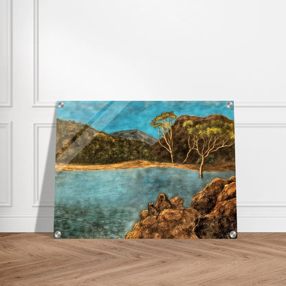 Blue lake with rocky shore, brown hills, slender trees, and turquoise sky in a quiet landscape.