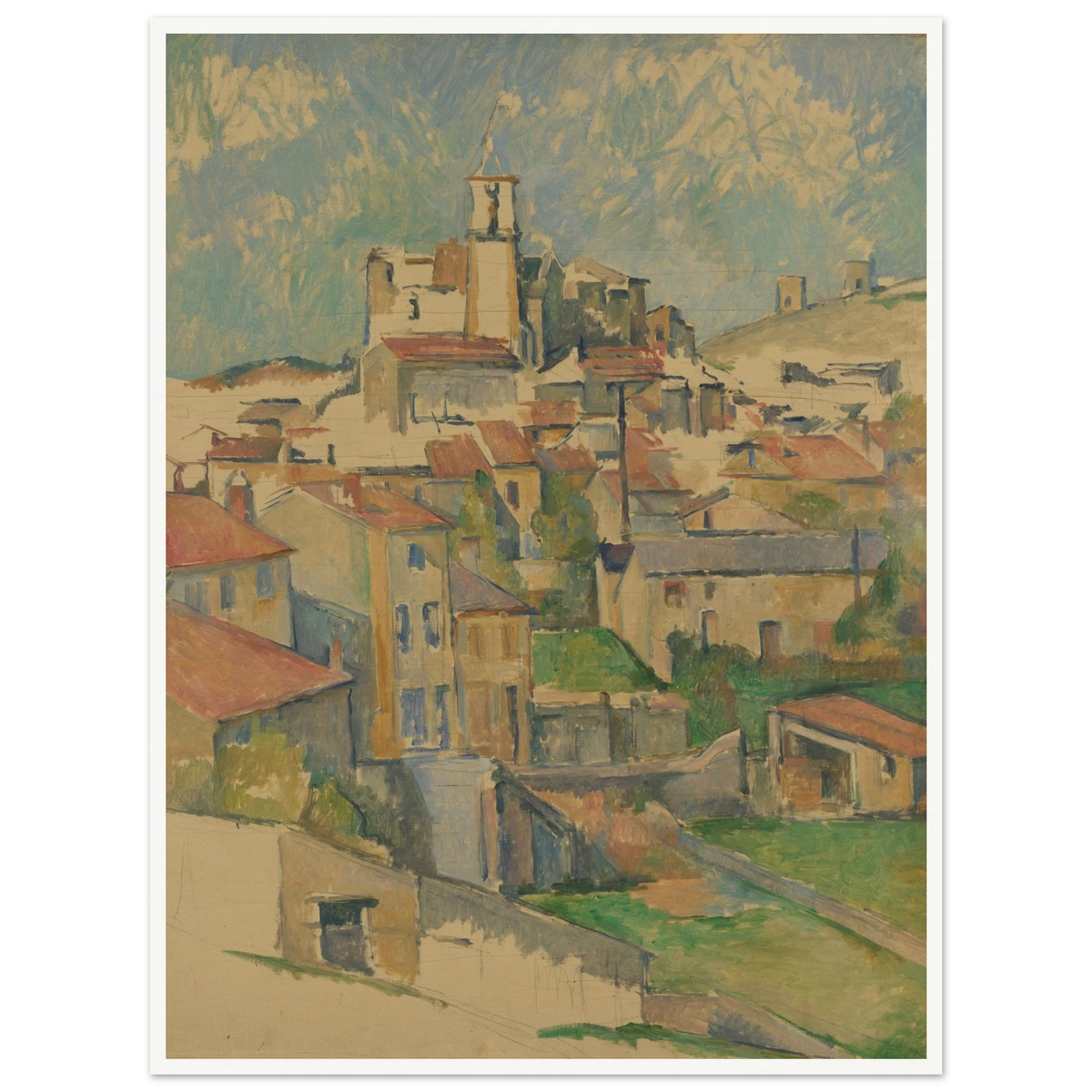 Hill town of Gardanne with red-roofed buildings and a church tower under a blue sky