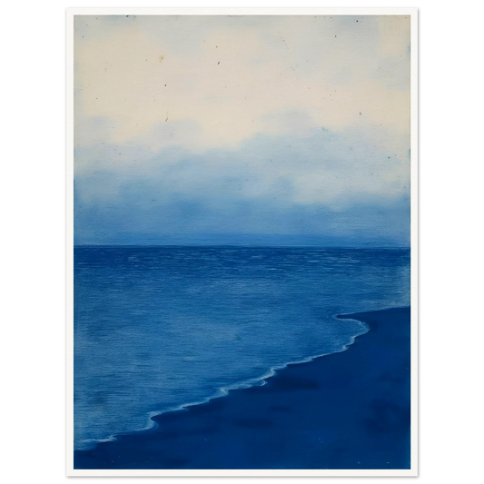 A calm, blue shoreline fades into the horizon under a soft, cloudy sky, evoking peace and solitude.