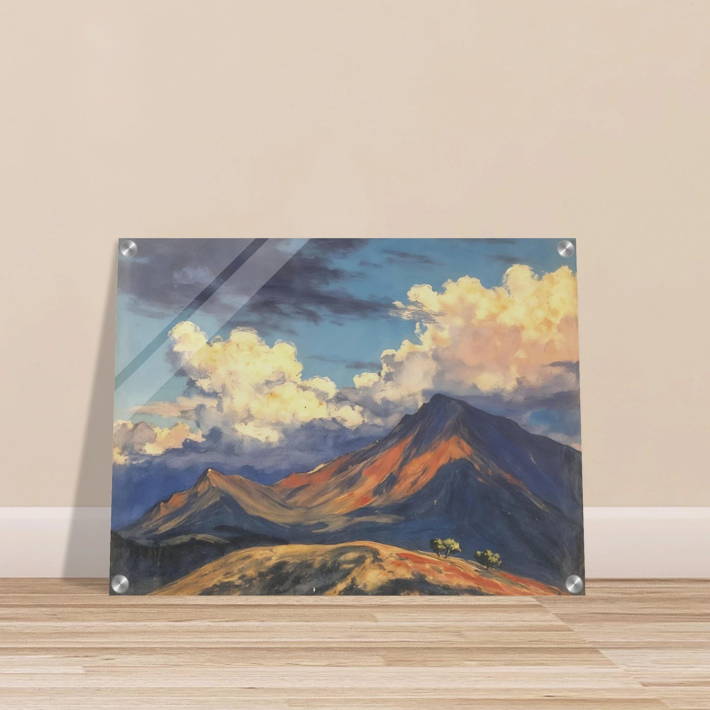 Sunlit mountain peaks glow beneath towering cream clouds and deep blue skies, with warm ridges stretching across an open landscape.