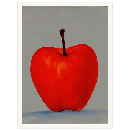 A vivid red apple stands alone against a muted gray backdrop, its glowing form balancing simplicity, boldness, and quiet elegance.