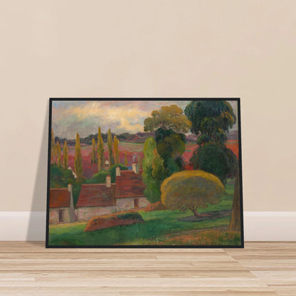 A Breton village with red-roofed houses and tall trees sits beneath a soft pastel sky.