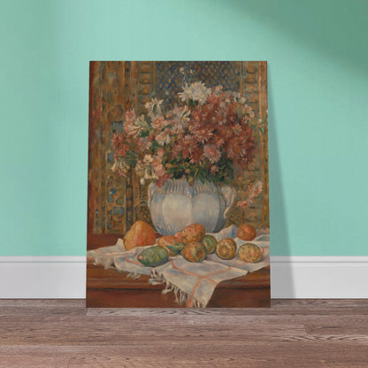 Autumn flowers in a blue vase with prickly pears and cloth on a table before a patterned screen.