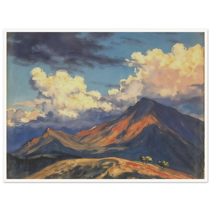 Sunlit mountain peaks glow beneath towering cream clouds and deep blue skies, with warm ridges stretching across an open landscape.