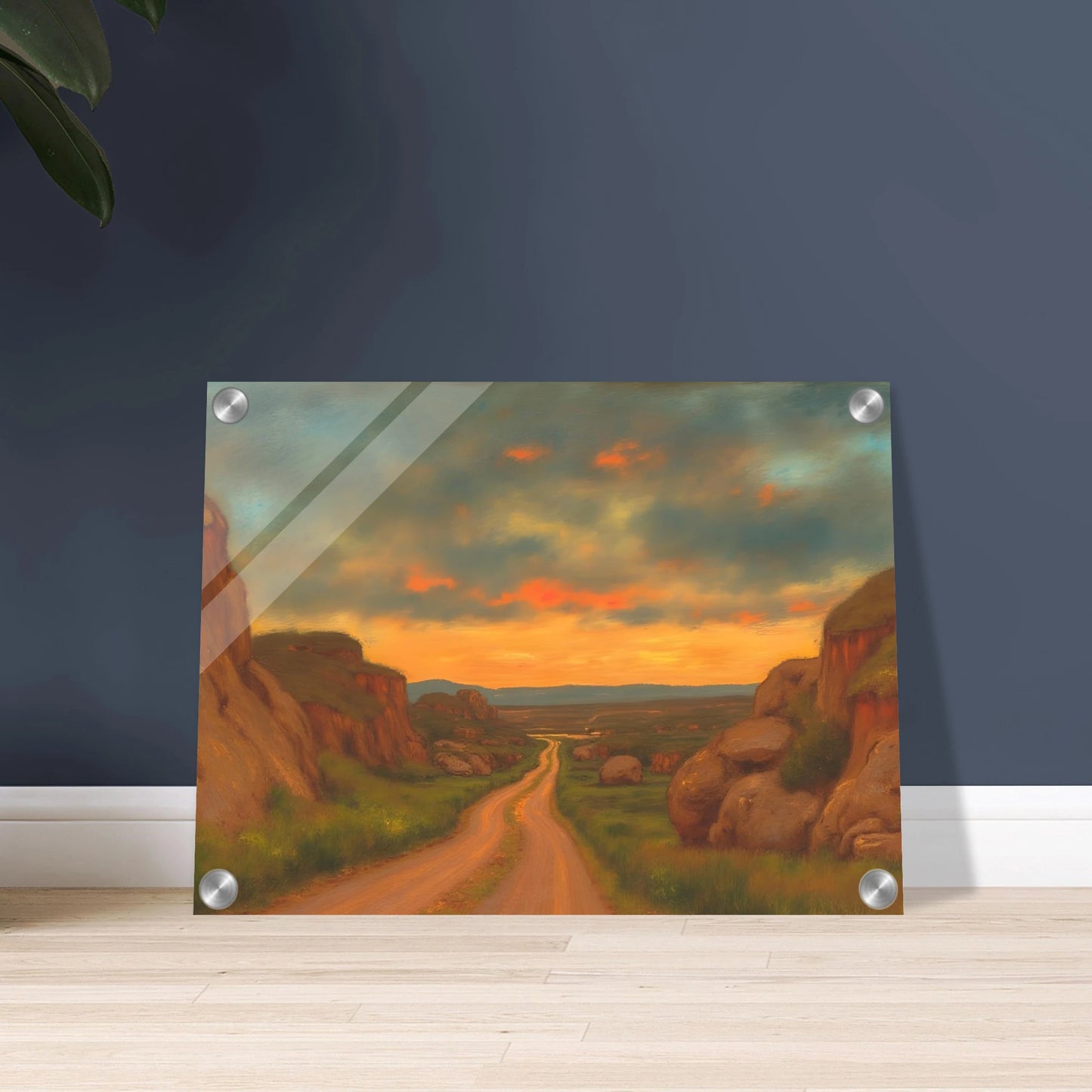 A winding dirt road cuts through rocky hills under a glowing sunset sky, evoking peace, wanderlust, and quiet reflection.