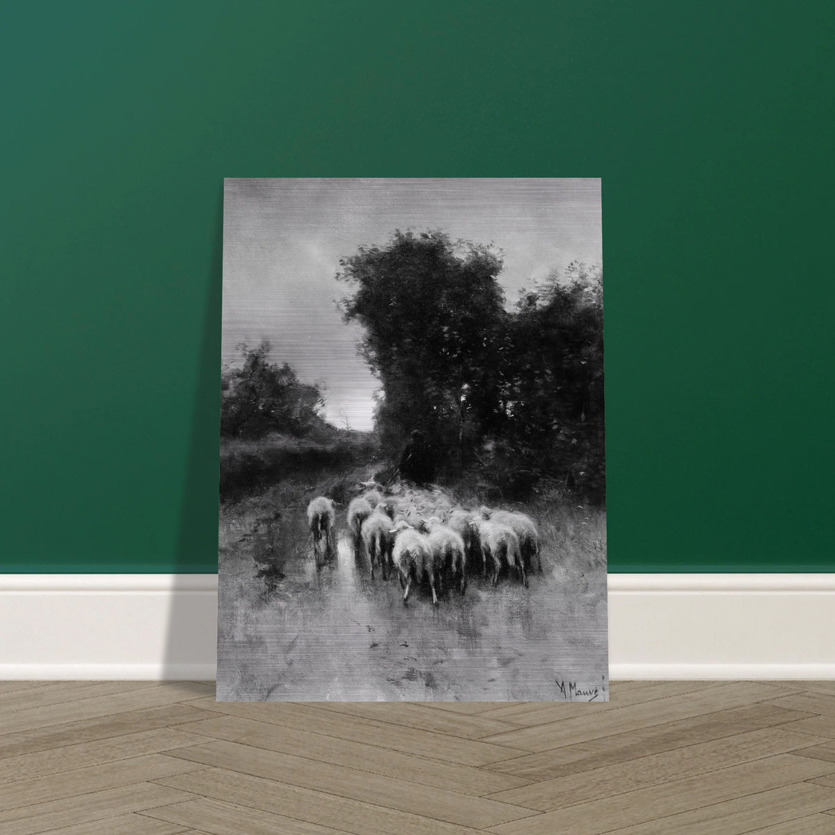 A shepherd leads a flock of sheep along a wooded path beneath tall trees and a cloudy sky.
