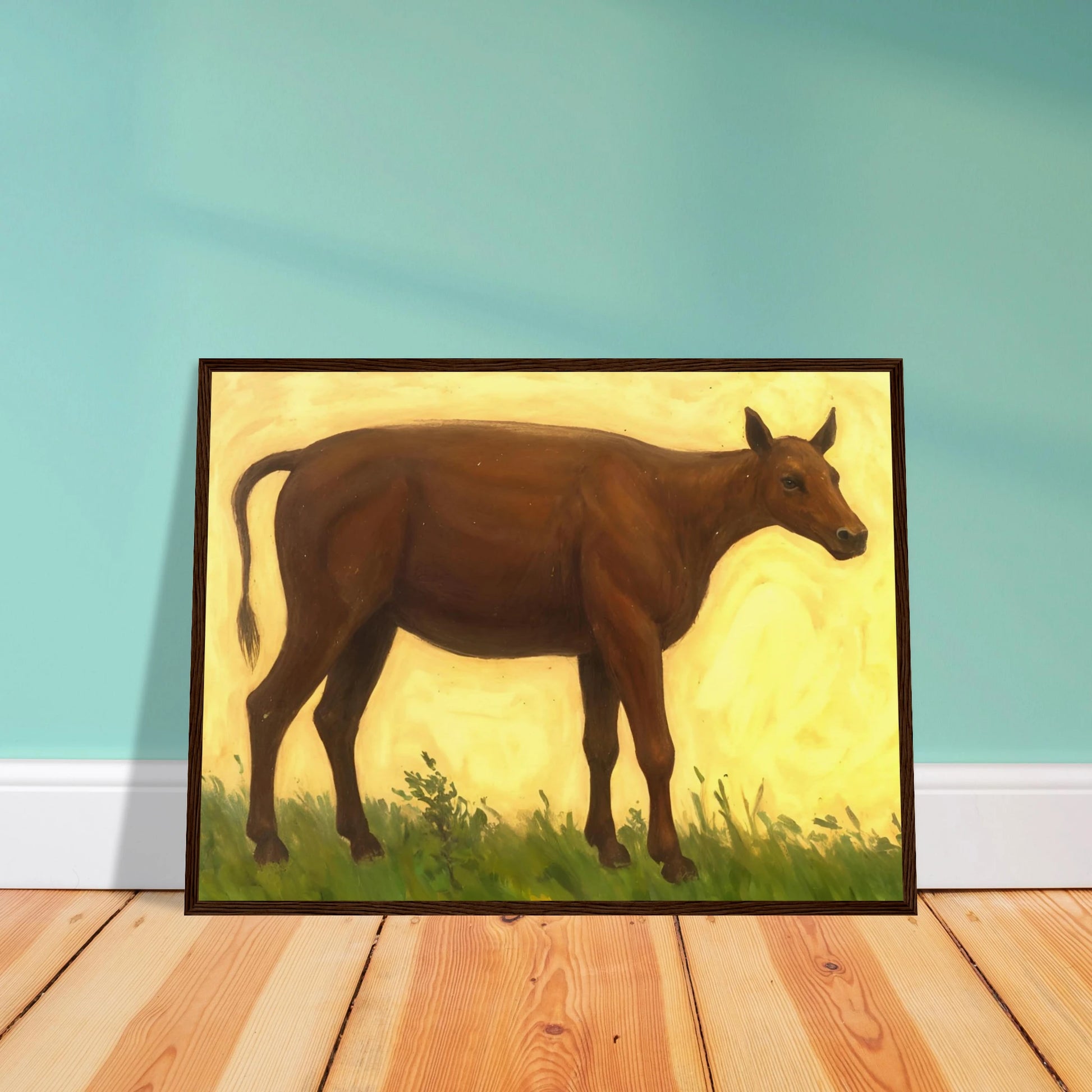 A brown cow standing on grassy pasture against a soft golden-yellow background, exuding calm and simplicity.
