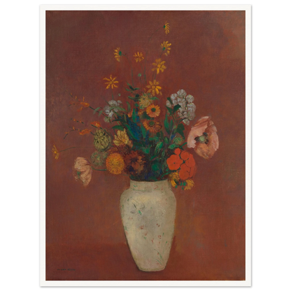 Flowers in a white vase against a red background with yellow and orange blooms