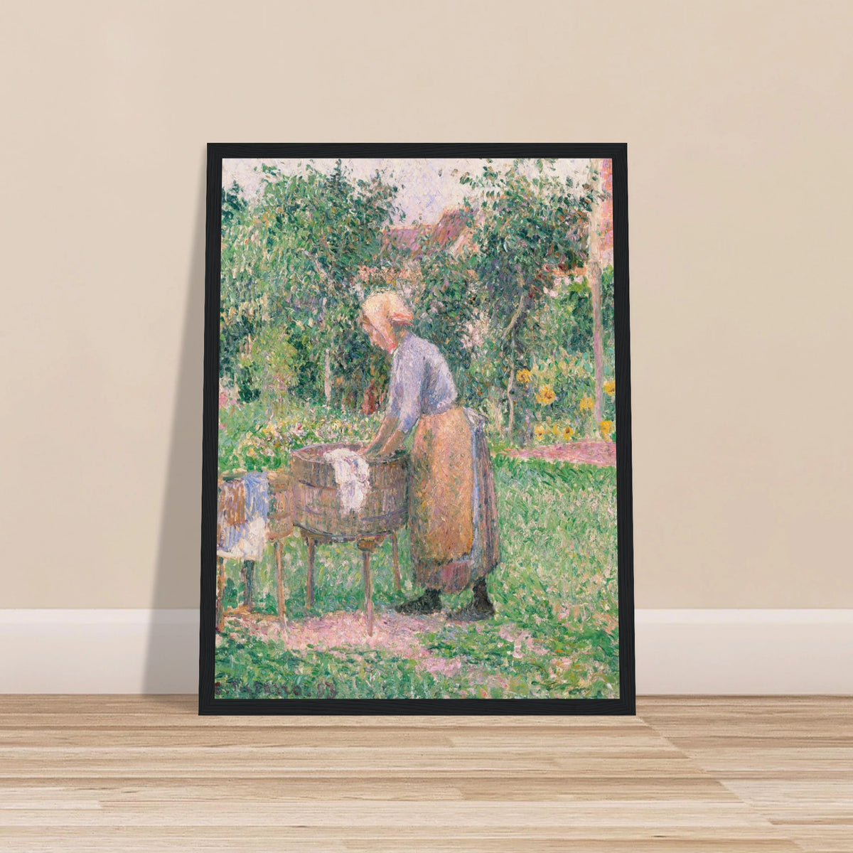 A Pointillist painting of a washerwoman hard at work, scrubbing linens and clothing in one barrel and rinsing them in another. 