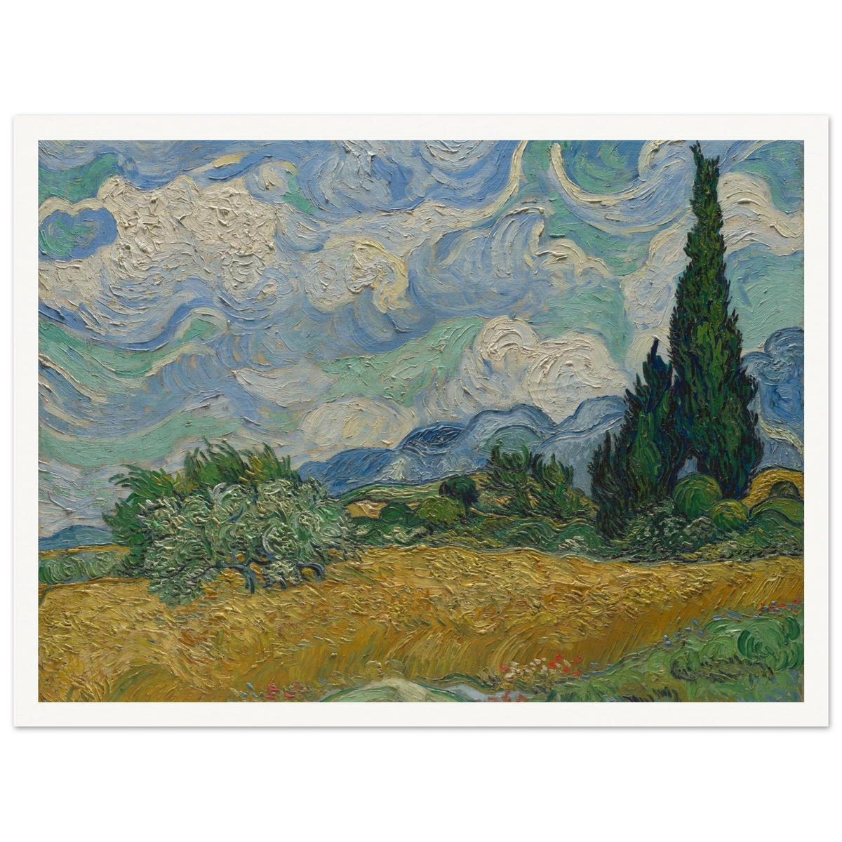 Golden wheat field and dark cypress trees beneath swirling blue-and-white clouds in a vivid Provençal landscape.