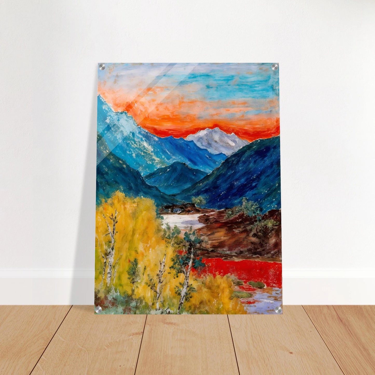 Snow-capped peaks rise above deep blue valleys and golden trees, beneath a fiery sunset glowing across the horizon.