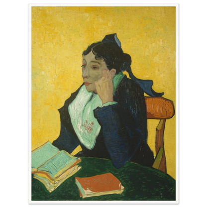 Woman in black and green sits at a table with open books against a vivid yellow background.