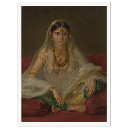 A Mughal woman in a sheer white veil and gold jewelry sits cross-legged on deep red cushions.