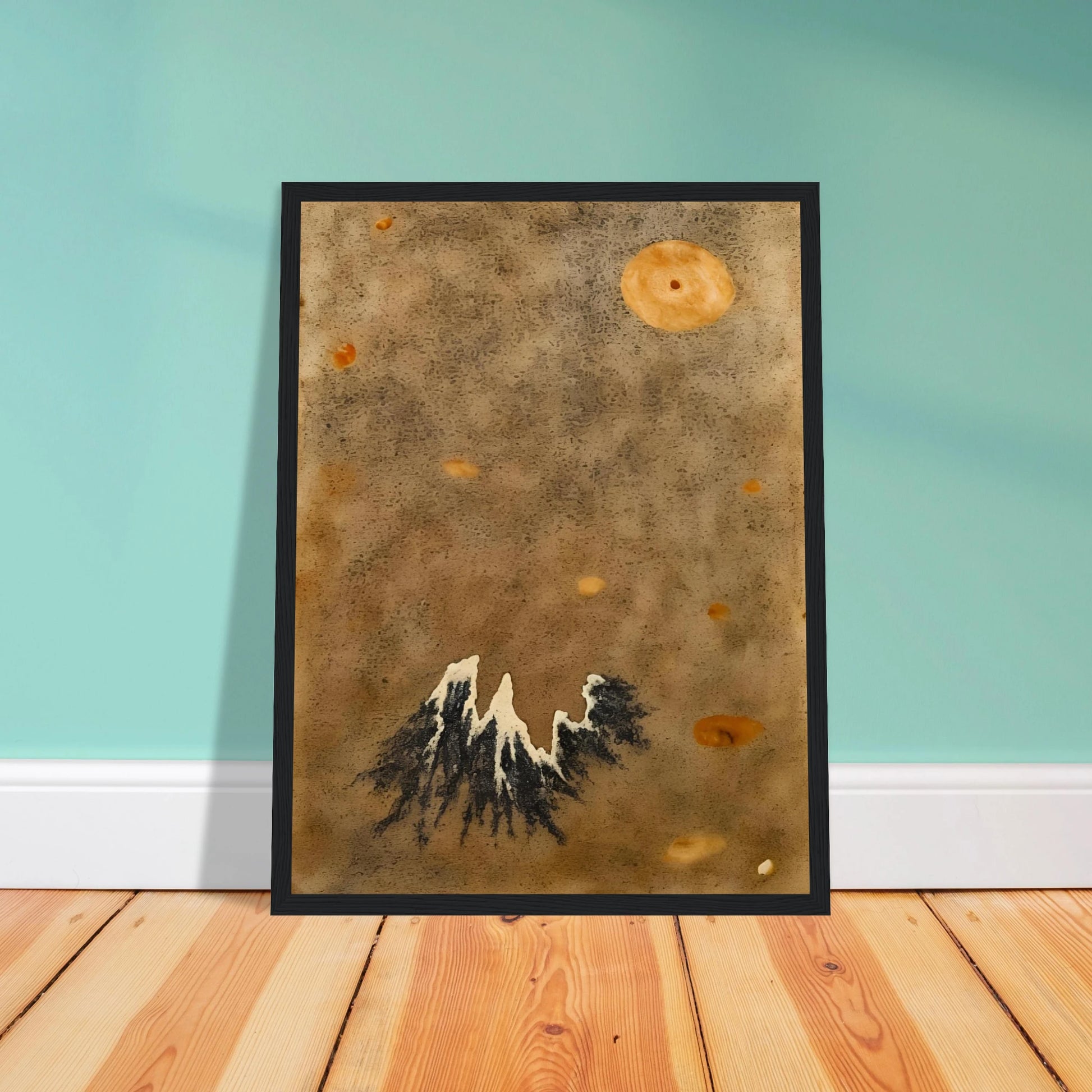 Snow-capped black mountain rises below a hazy orange moon in a muted, dust-toned sky.