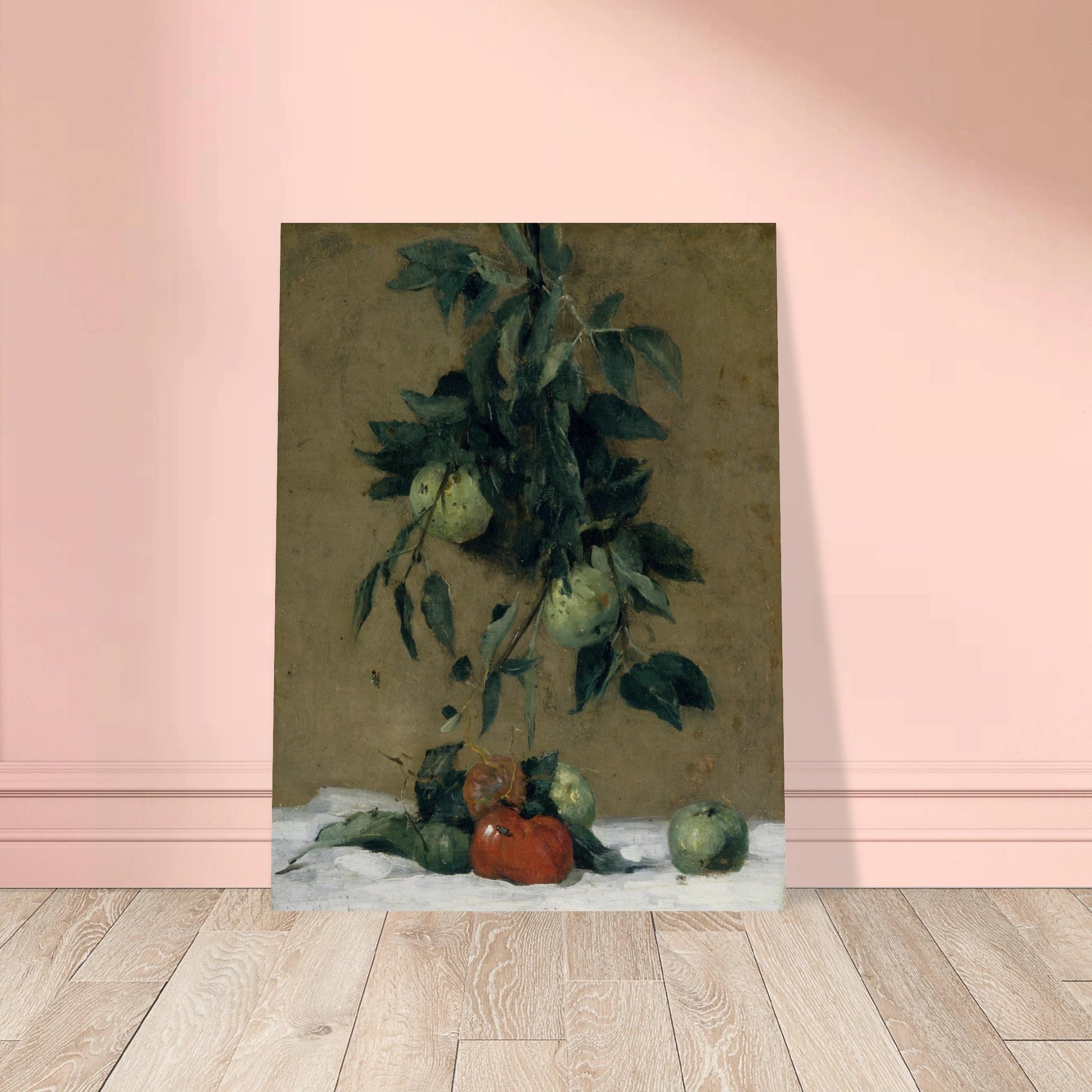 Apples and leaves hang above red fruit on a white cloth in a muted still life