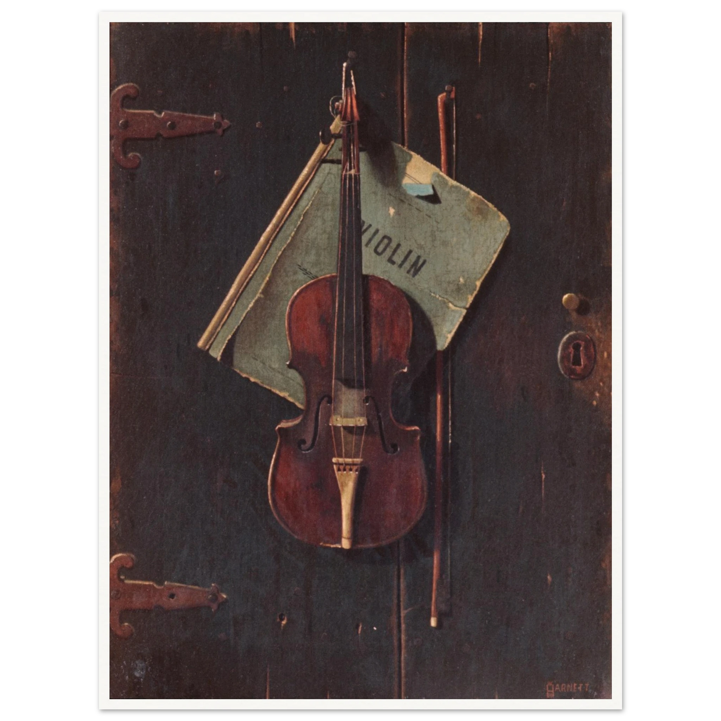 Violin and bow hang against a dark wooden door with a faded paper behind them