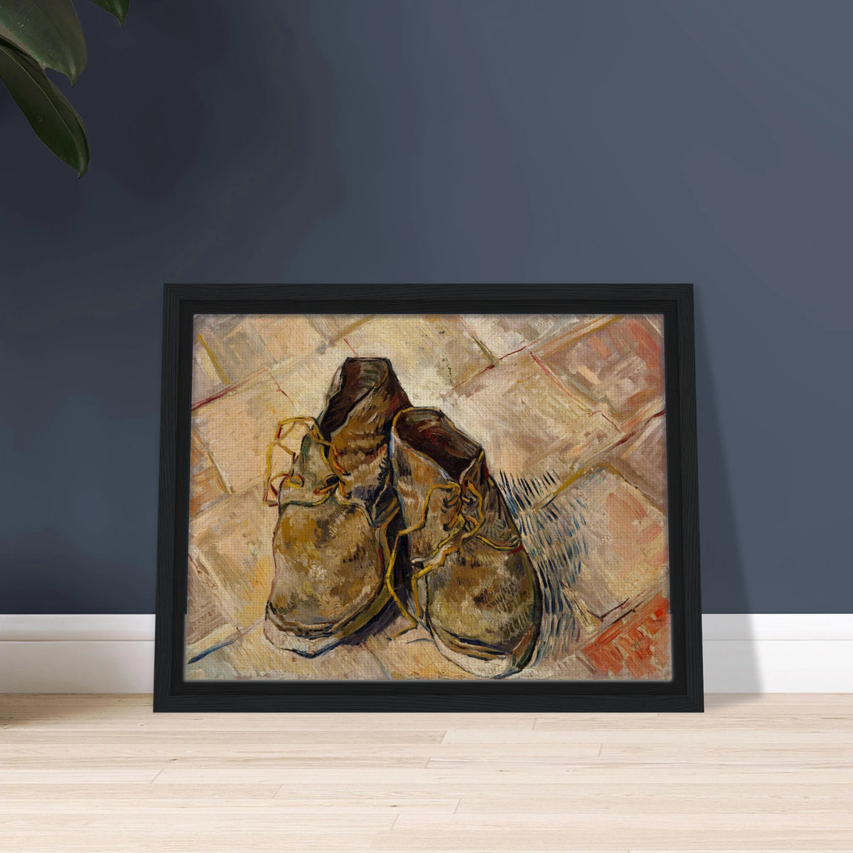 A pair of worn brown shoes with yellow laces rests on a pale tiled floor.