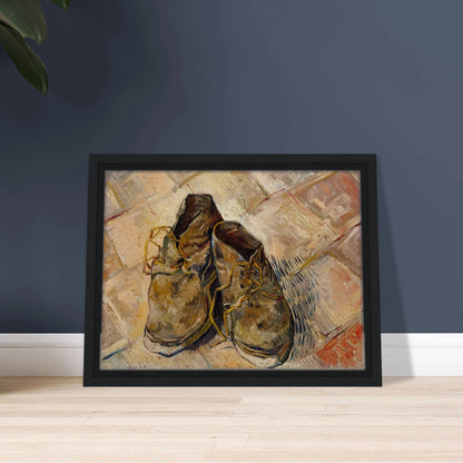A pair of worn brown shoes with yellow laces rests on a pale tiled floor.