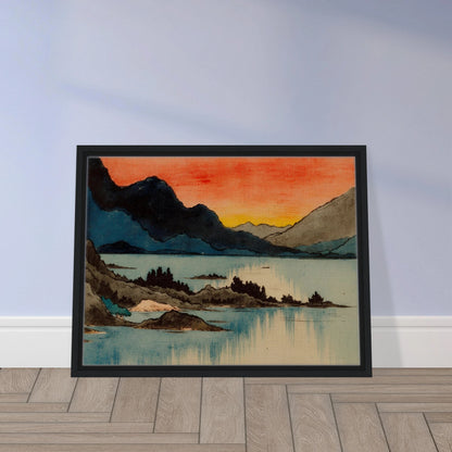 Layered mountain silhouettes meet a glowing red and yellow sunset above calm blue lake waters in a serene scenic view.