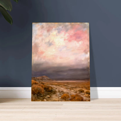 A dreamy desert landscape beneath soft pink and lavender clouds, with golden brush, distant hills, and a tranquil open horizon.