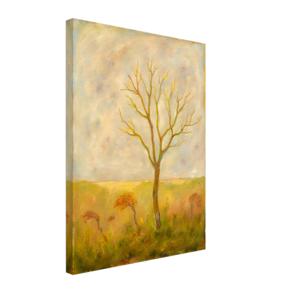 A lone tree stands tall in a golden meadow under a pale sky, its bare branches reaching gracefully toward the light.