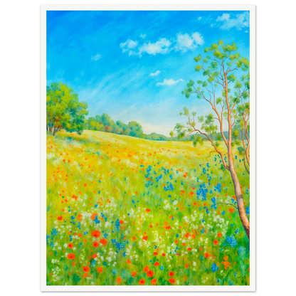 Bright wildflower meadow under clear blue sky with delicate trees, colorful blossoms, and sunlit greenery stretching across a serene spring landscape.