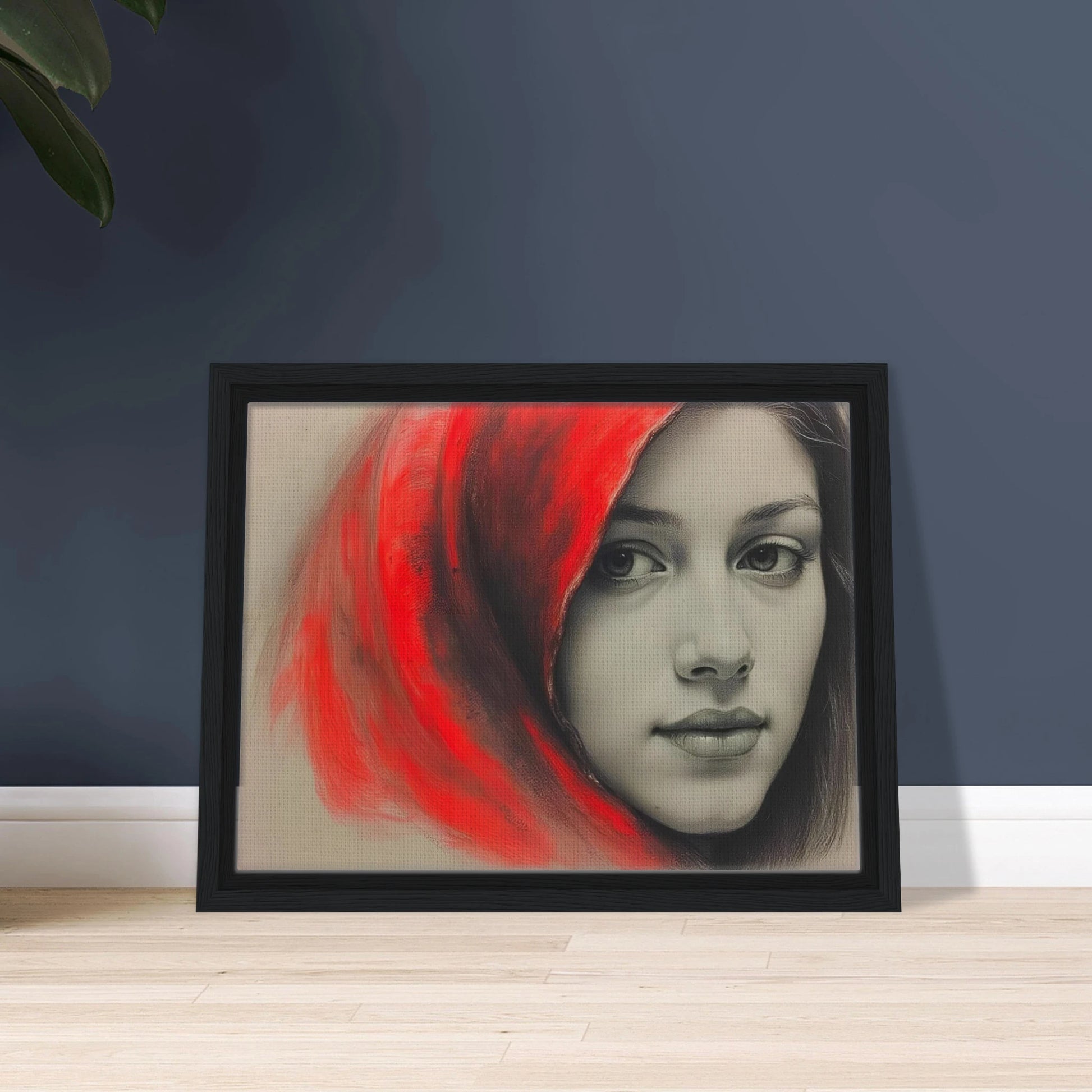 A soft portrait of a young woman draped in a vivid red hood, her calm gaze contrasting with the fiery energy surrounding her.