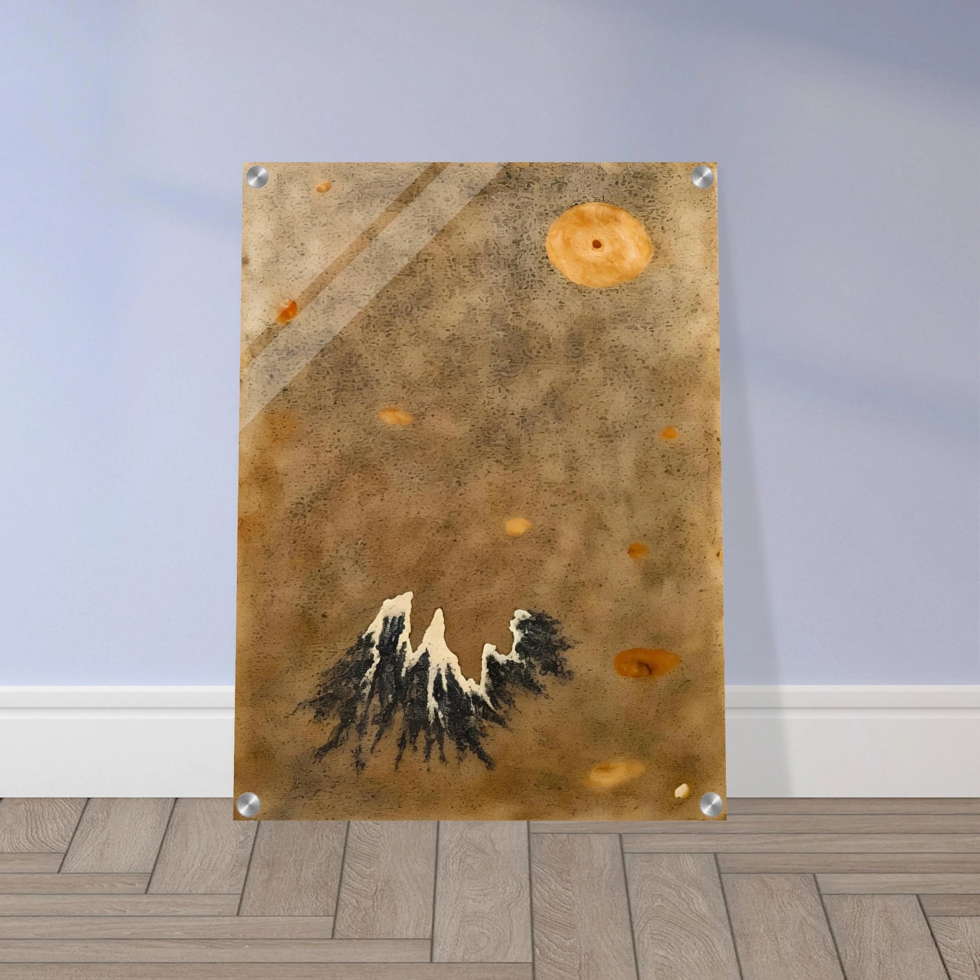 Snow-capped black mountain rises below a hazy orange moon in a muted, dust-toned sky.