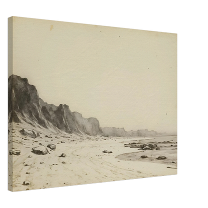 Minimal coastal landscape with pale sandy shore, rugged cliffs, scattered stones, and calm sea rendered in soft monochrome tones.