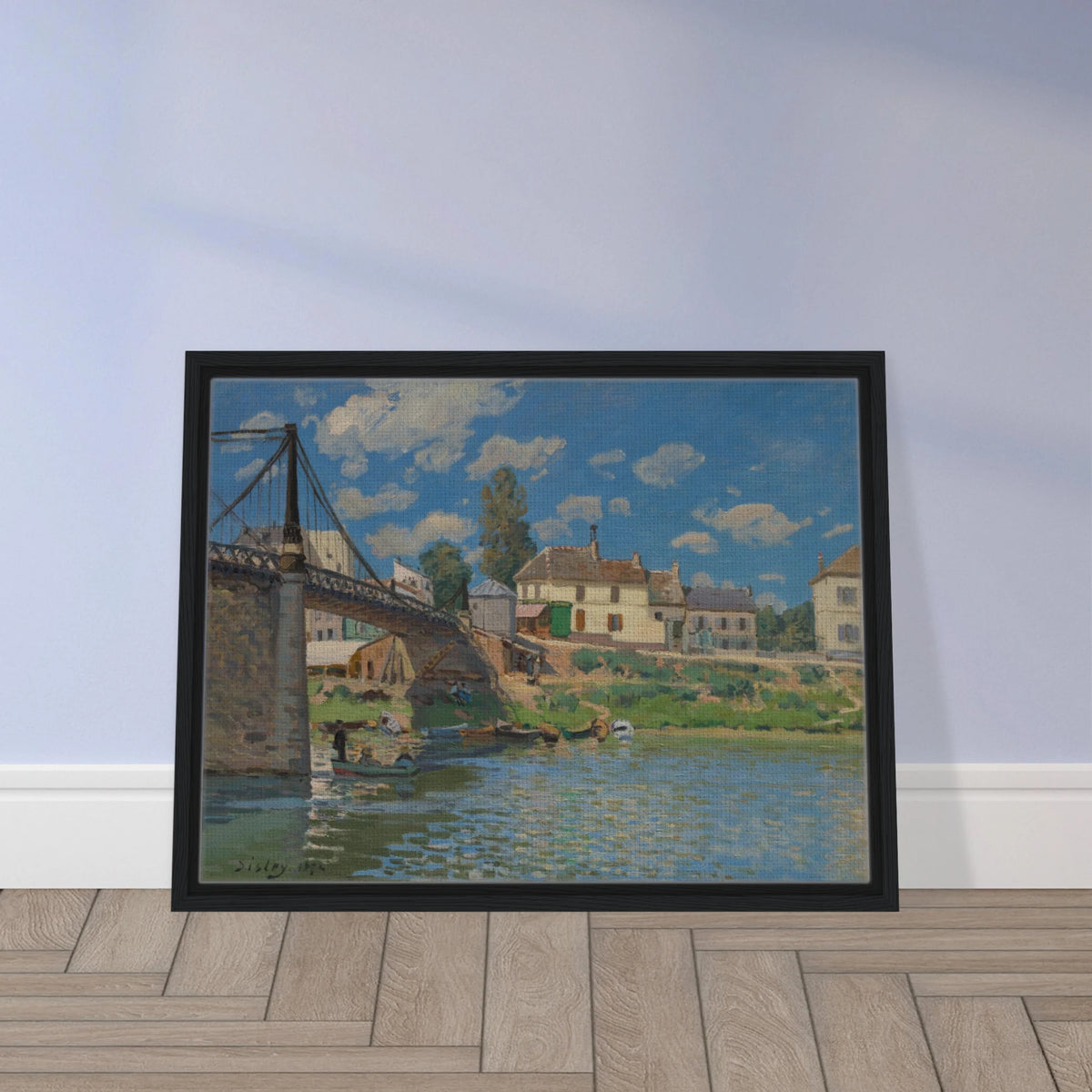 A suspension bridge, riverside houses, and small boats line the Seine under a bright blue sky.