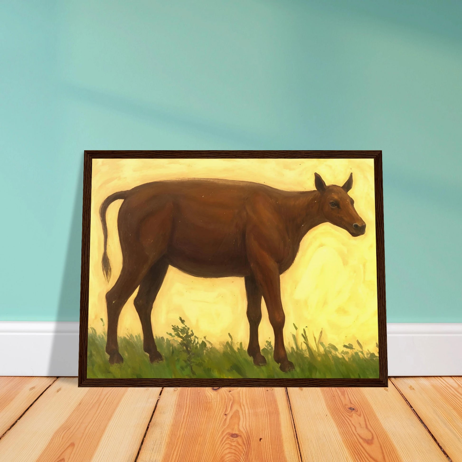 A brown cow standing on grassy pasture against a soft golden-yellow background, exuding calm and simplicity.