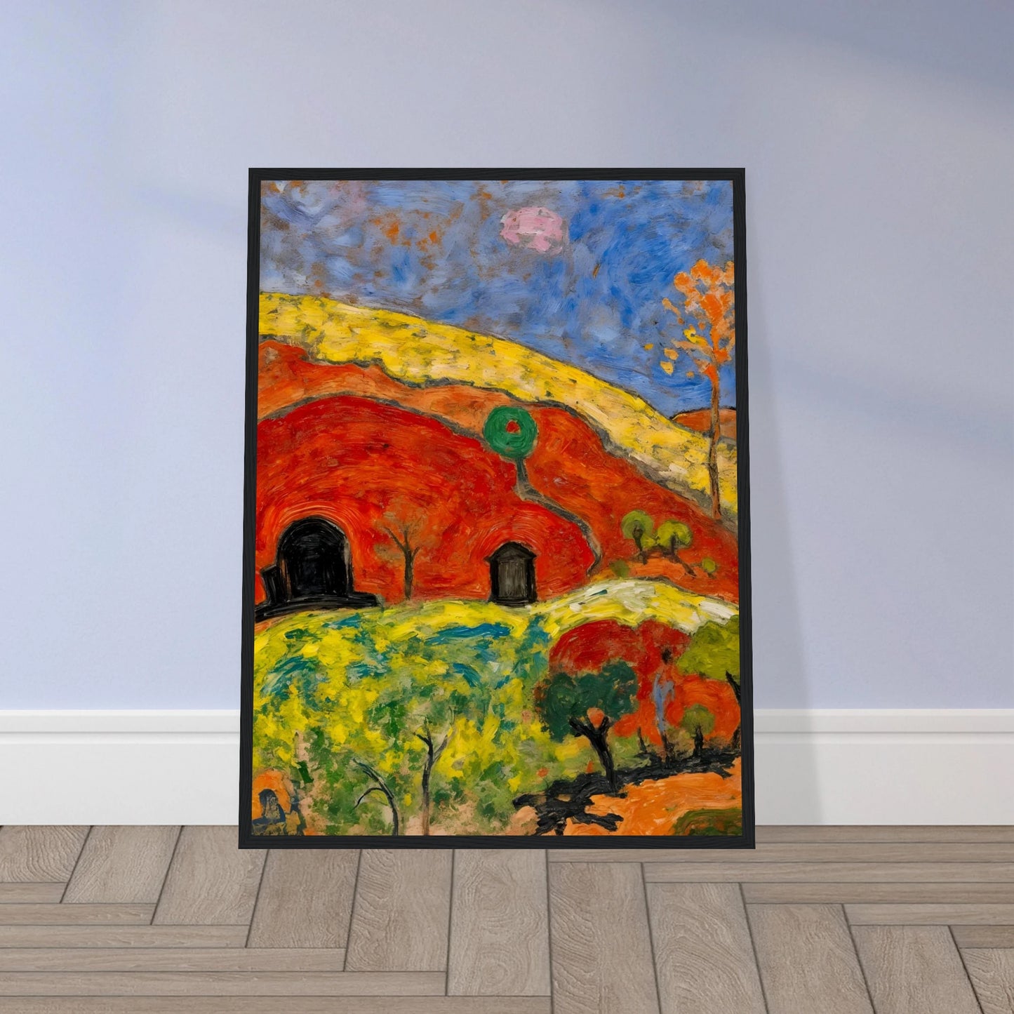 A vibrant expressionist landscape depicting red-orange hills with cave-like dwellings, scattered trees, rolling yellow-green fields, and a deep blue sky illuminated by a pale moon.
