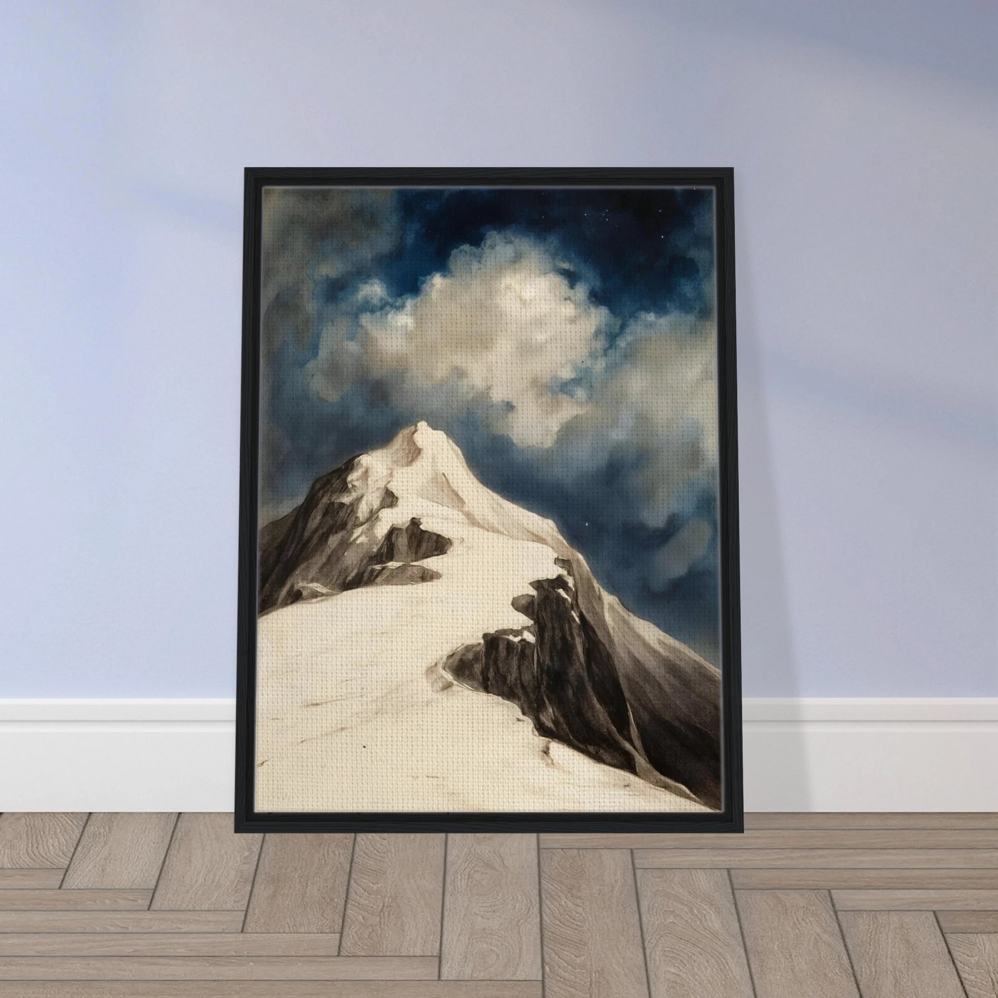 A snow-covered mountain peak rises beneath luminous clouds and a deep midnight sky, capturing solitude and awe.