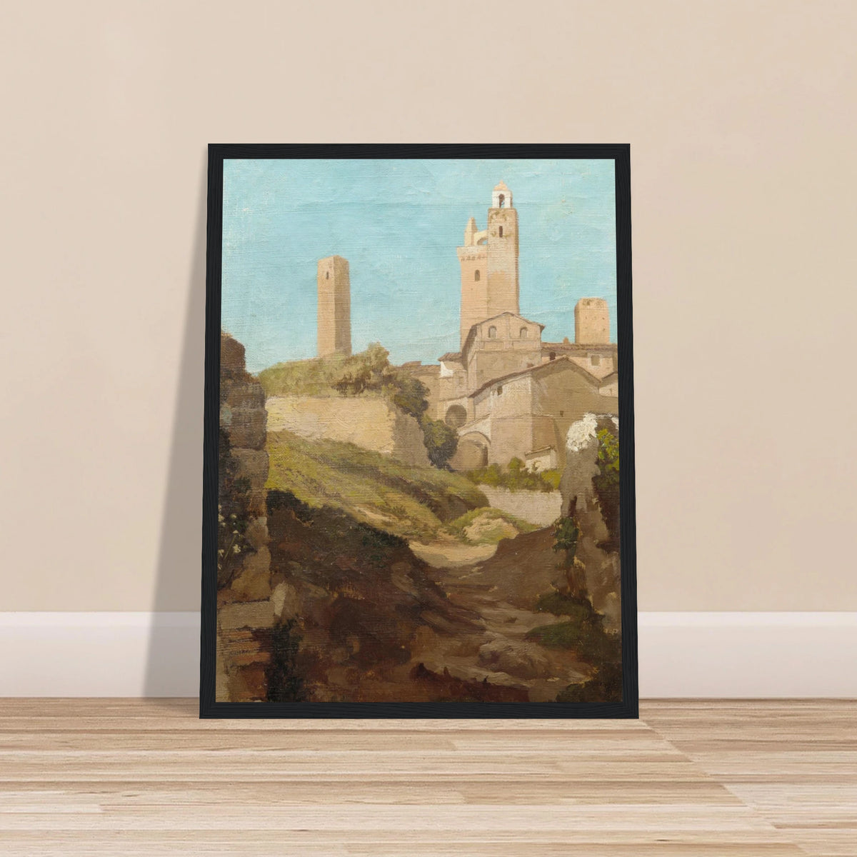 Medieval towers rise above San Gimignano’s sunlit hill town and rough path under a pale blue sky.