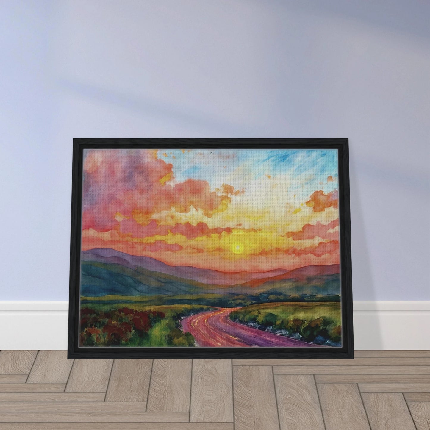 Vibrant watercolor landscape of a winding road through rolling hills beneath a glowing sunset sky filled with pink, gold, and blue clouds.