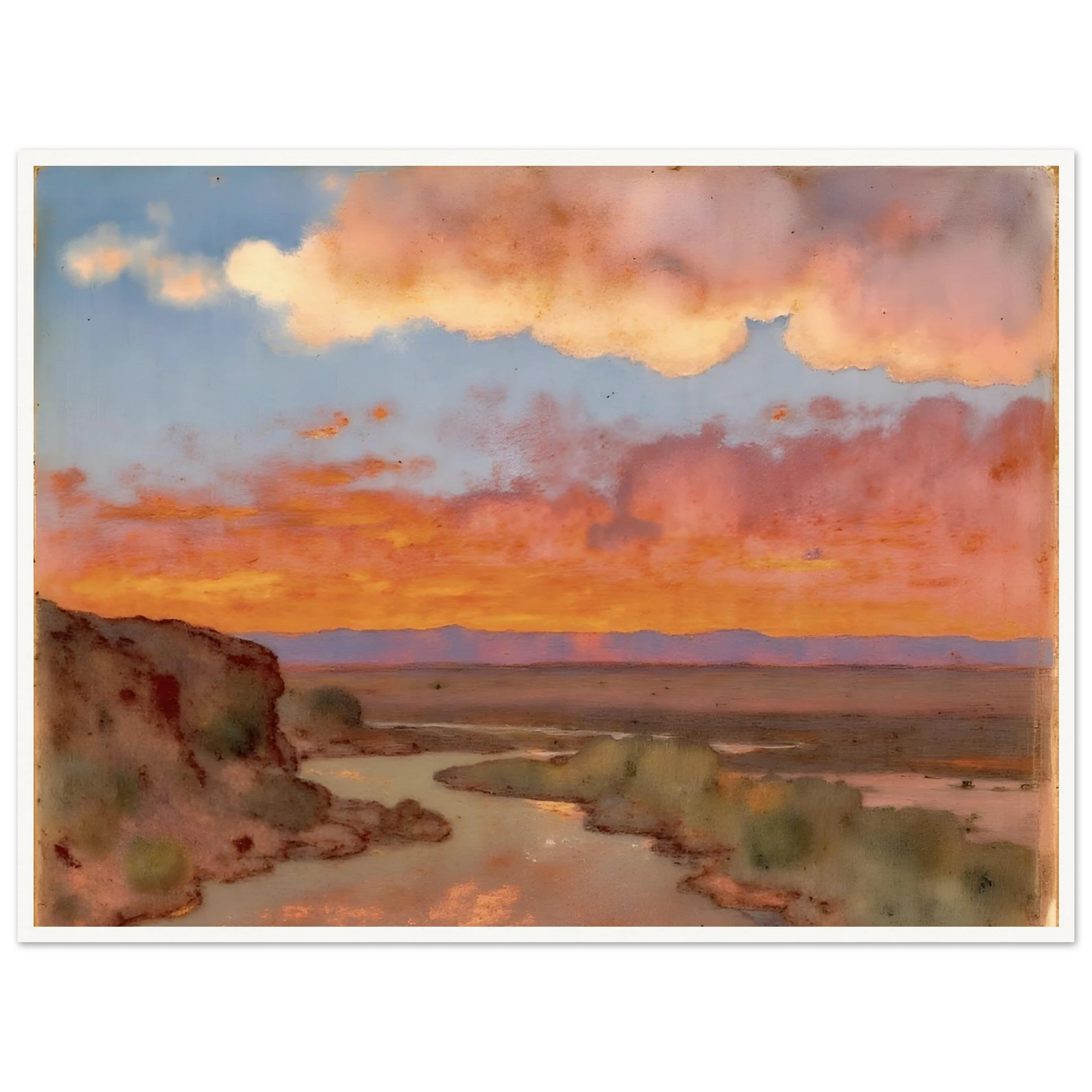 Soft desert river winding beneath glowing orange and pink sunset clouds, with distant plains and muted cliffs in a serene landscape.