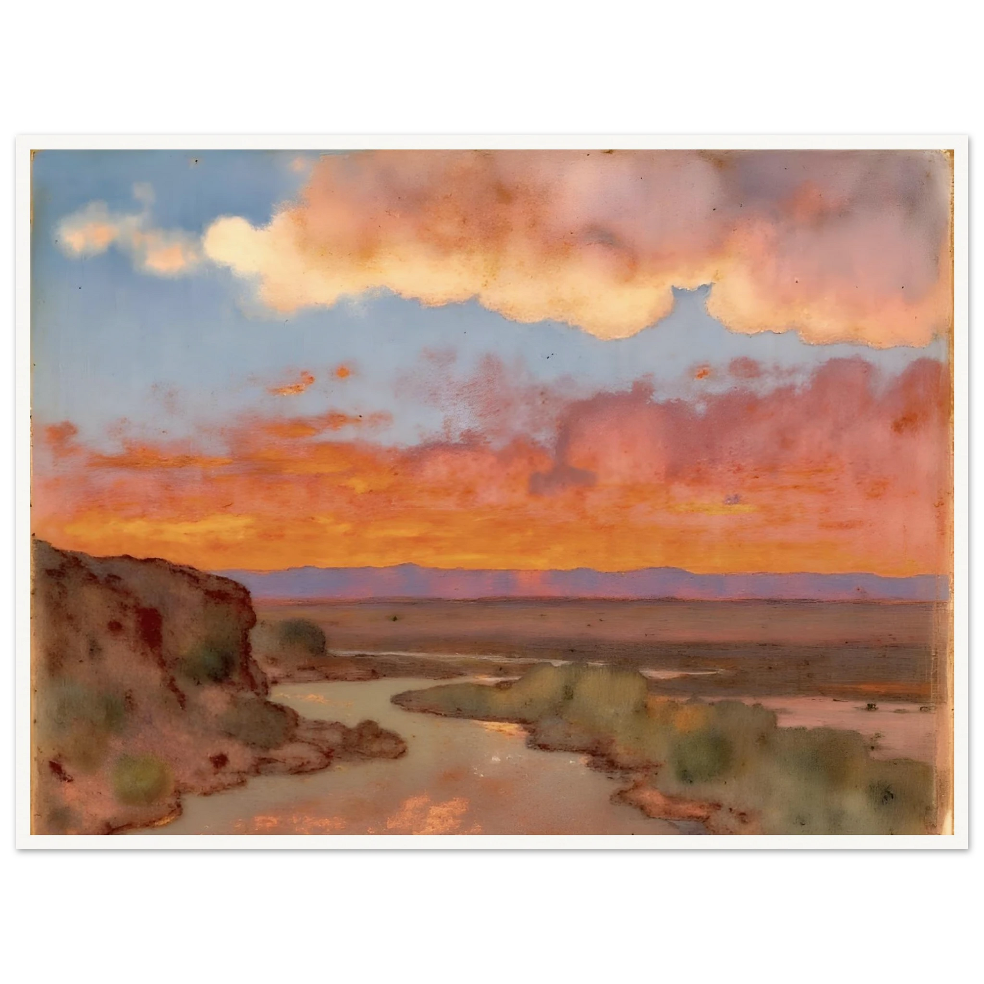 Soft desert river winding beneath glowing orange and pink sunset clouds, with distant plains and muted cliffs in a serene landscape.