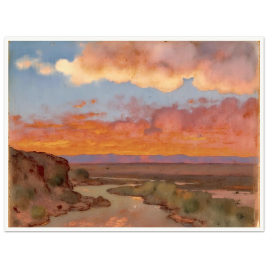 Soft desert river winding beneath glowing orange and pink sunset clouds, with distant plains and muted cliffs in a serene landscape.