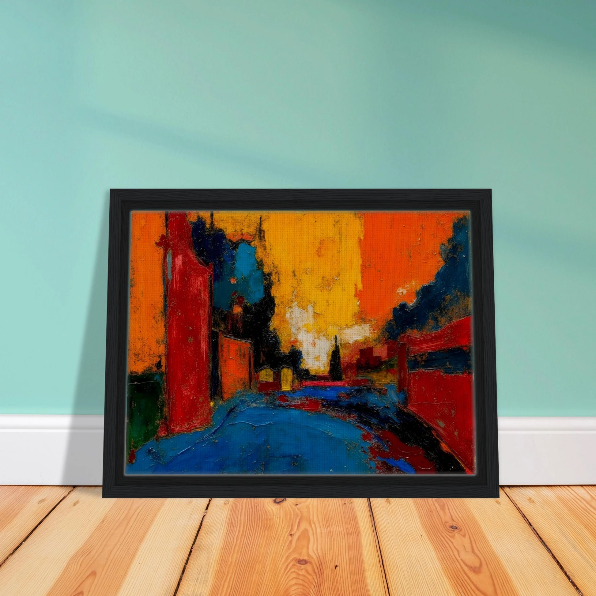 An expressive urban street scene painted in bold reds, oranges, blues, and black, featuring buildings lining a road beneath a dramatic glowing sunset sky.