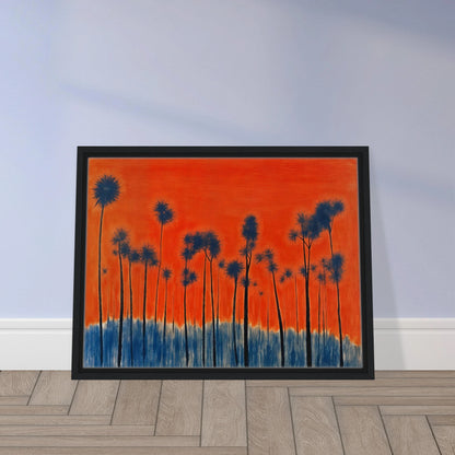 Dark silhouettes of tall palm-like trees rise against a vivid orange-red sky with deep blue ground tones, radiating intense warmth.