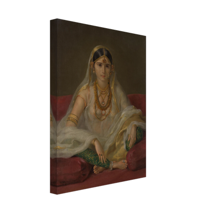 A Mughal woman in a sheer white veil and gold jewelry sits cross-legged on deep red cushions.
