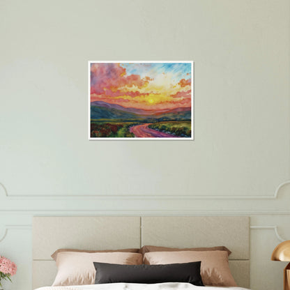 Vibrant watercolor landscape of a winding road through rolling hills beneath a glowing sunset sky filled with pink, gold, and blue clouds.