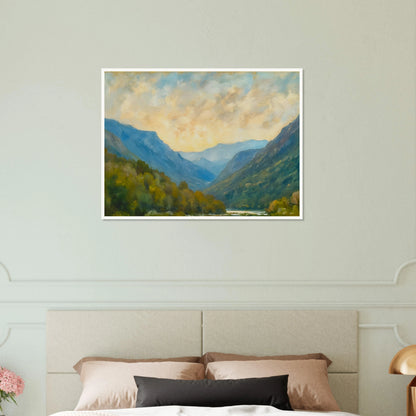 Peaceful mountain valley scene with layered blue ridges, autumn foliage, and a cloudy golden sky.