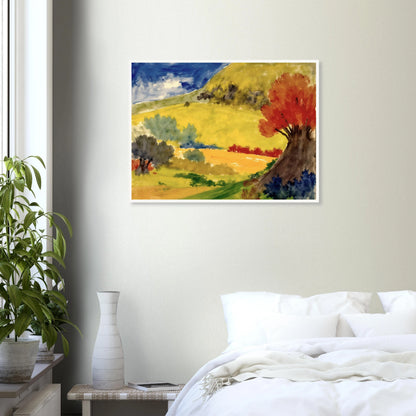 Red tree rises beside golden hills, green fields, and a deep blue sky in a bright countryside scene.