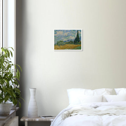 Golden wheat field and dark cypress trees beneath swirling blue-and-white clouds in a vivid Provençal landscape.