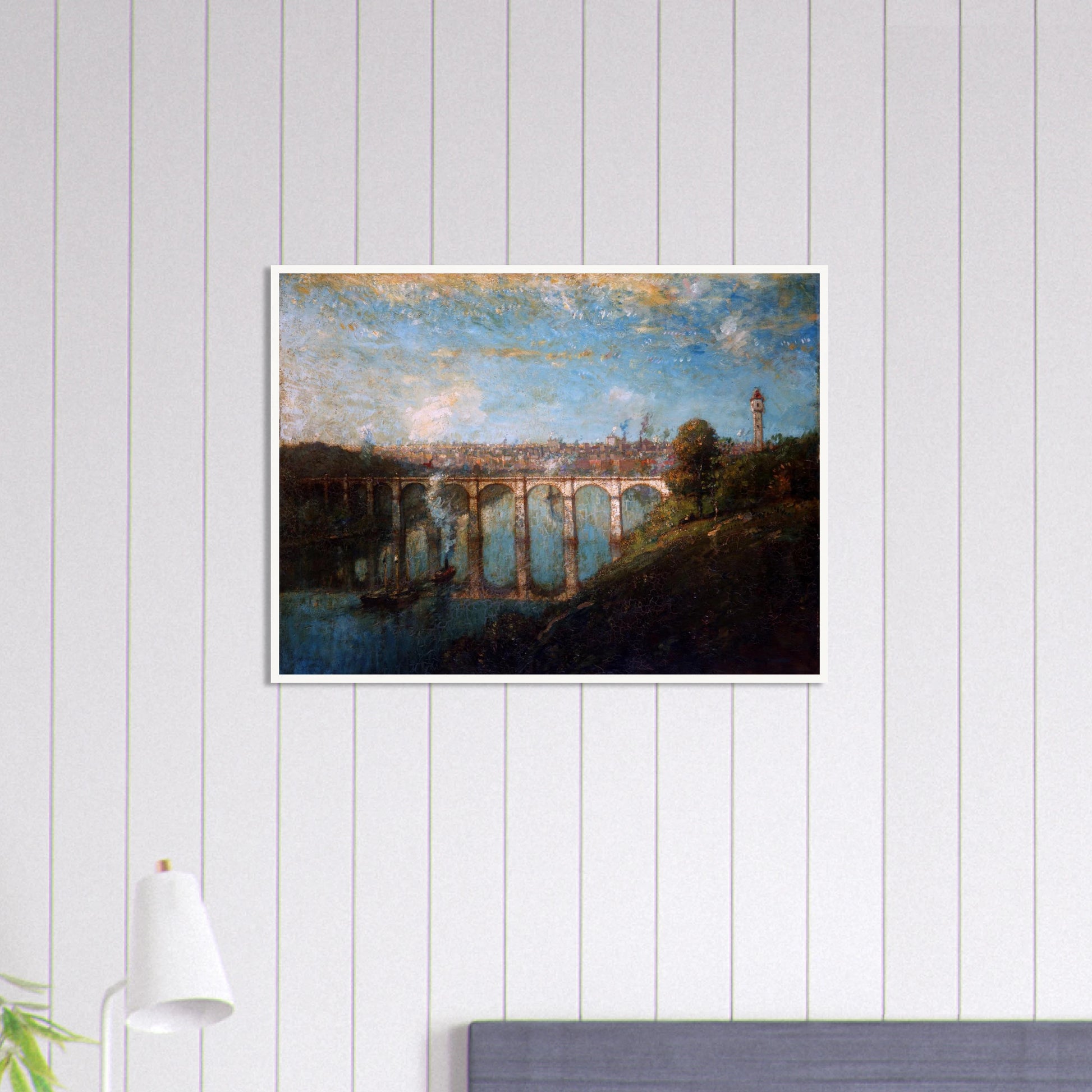 Arched bridge spans a blue river beneath a city skyline and tall tower