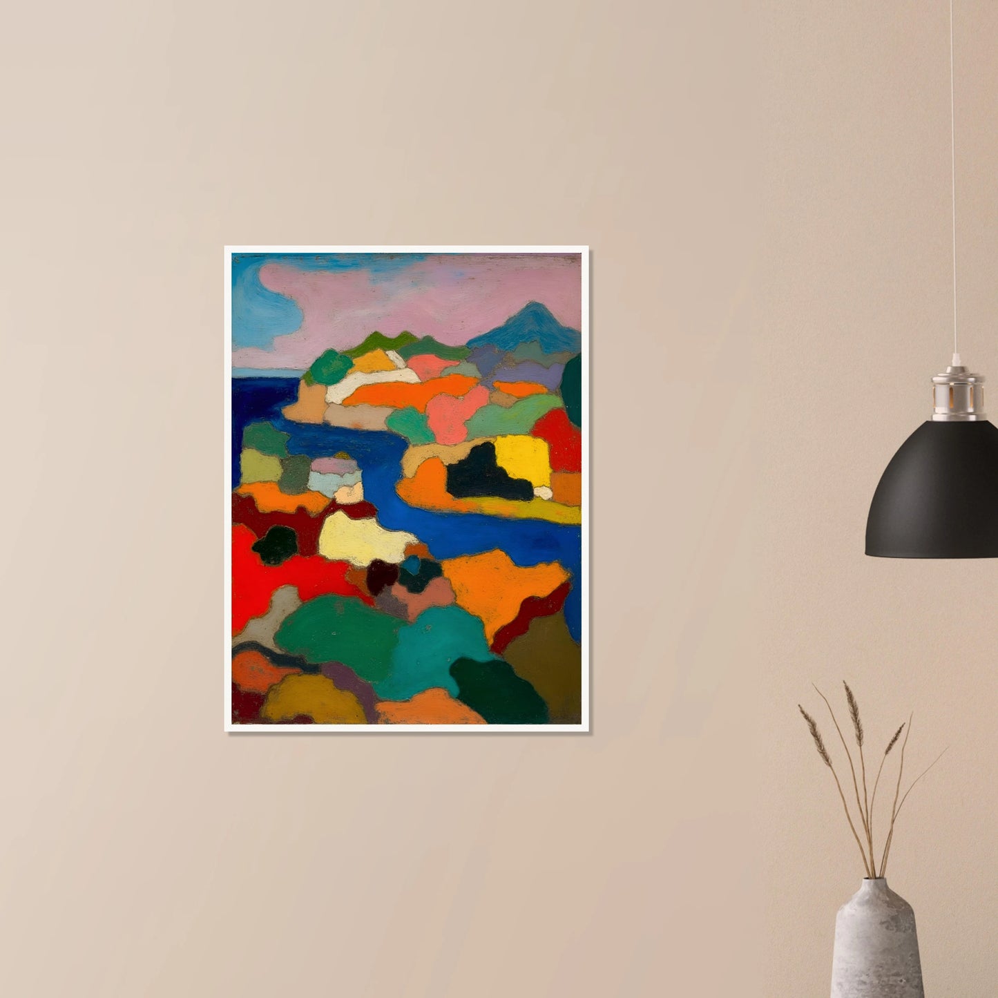 Vivid coastal hills and blue water unfold beneath a pink sky and distant mountain.