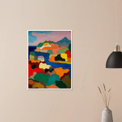 Vivid coastal hills and blue water unfold beneath a pink sky and distant mountain.