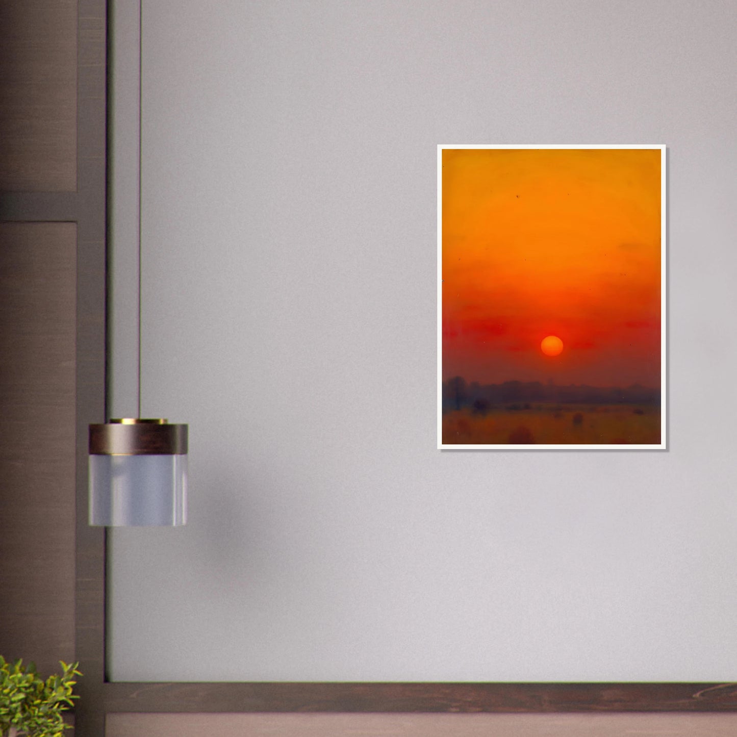 A golden-orange sunset over a hazy horizon, with the sun glowing in a vivid red and amber sky.