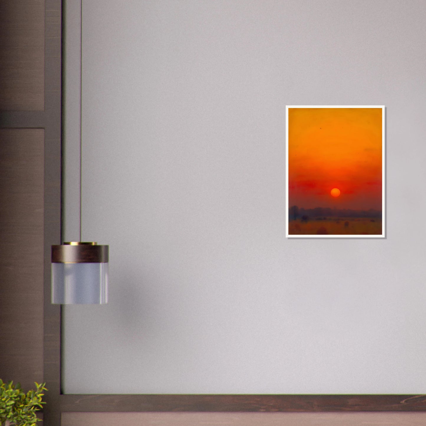 A golden-orange sunset over a hazy horizon, with the sun glowing in a vivid red and amber sky.